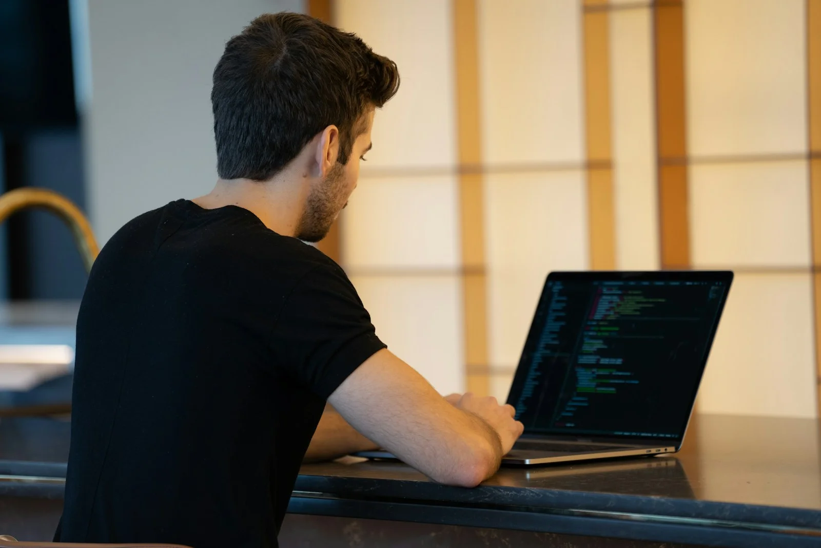 Person focused at a computer screen