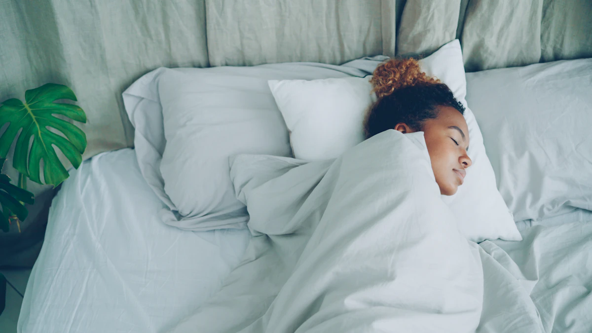 Person asleep in a bedroom at night
