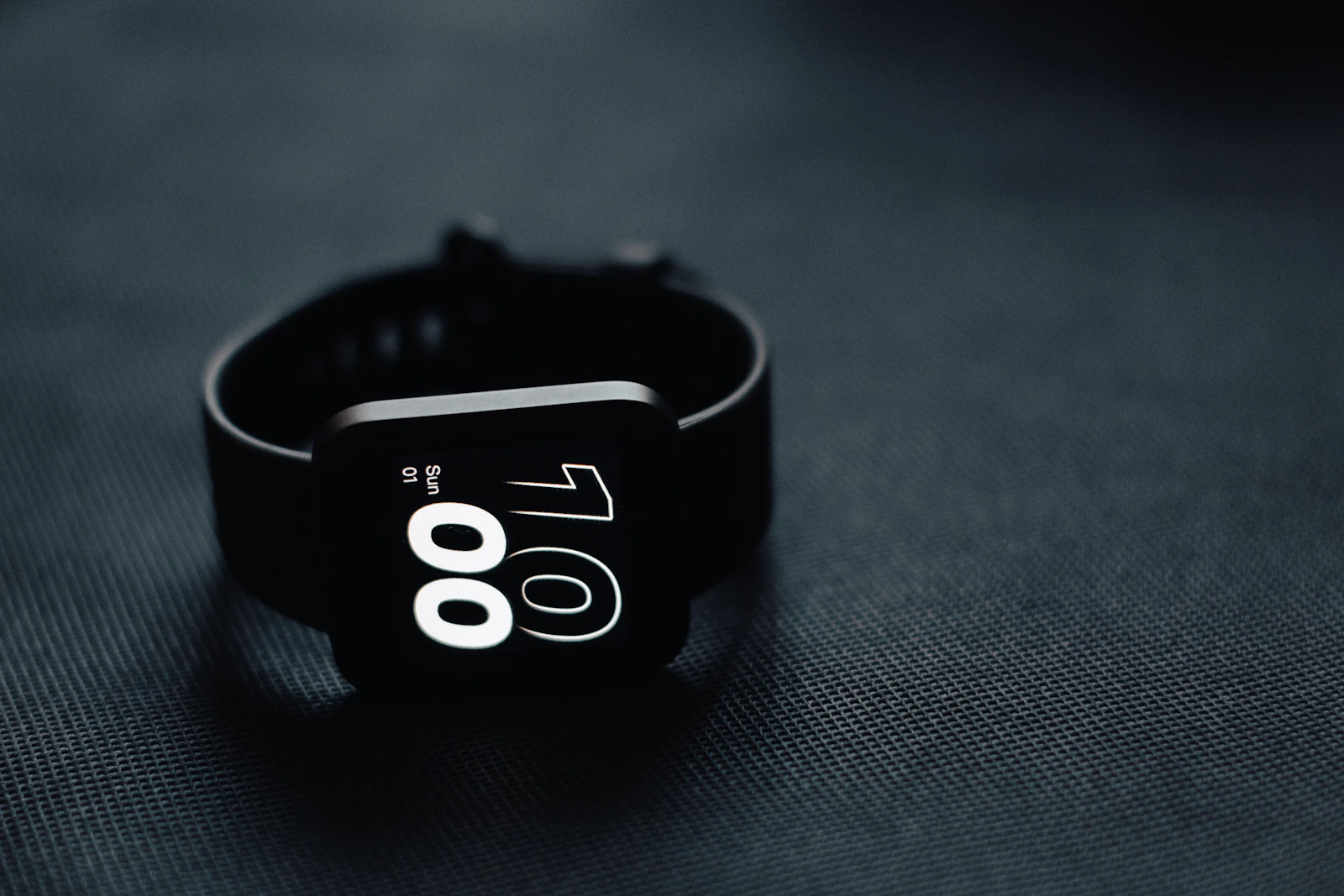 Smartwatch worn on the wrist displaying health data